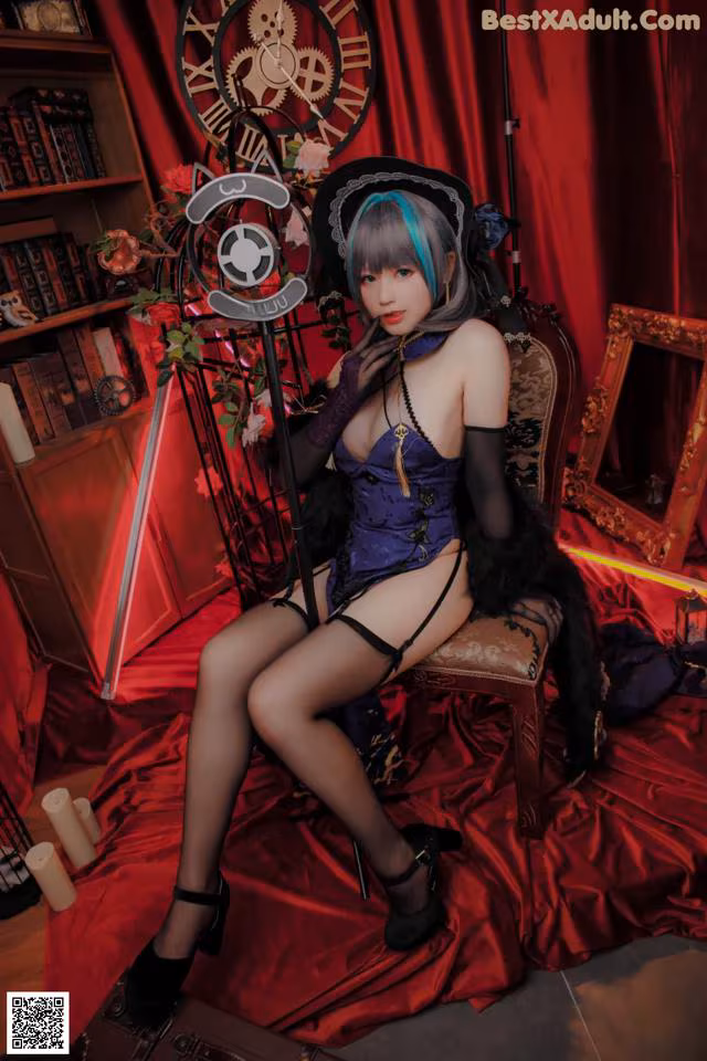 A woman sitting on a chair in a room with a clock.